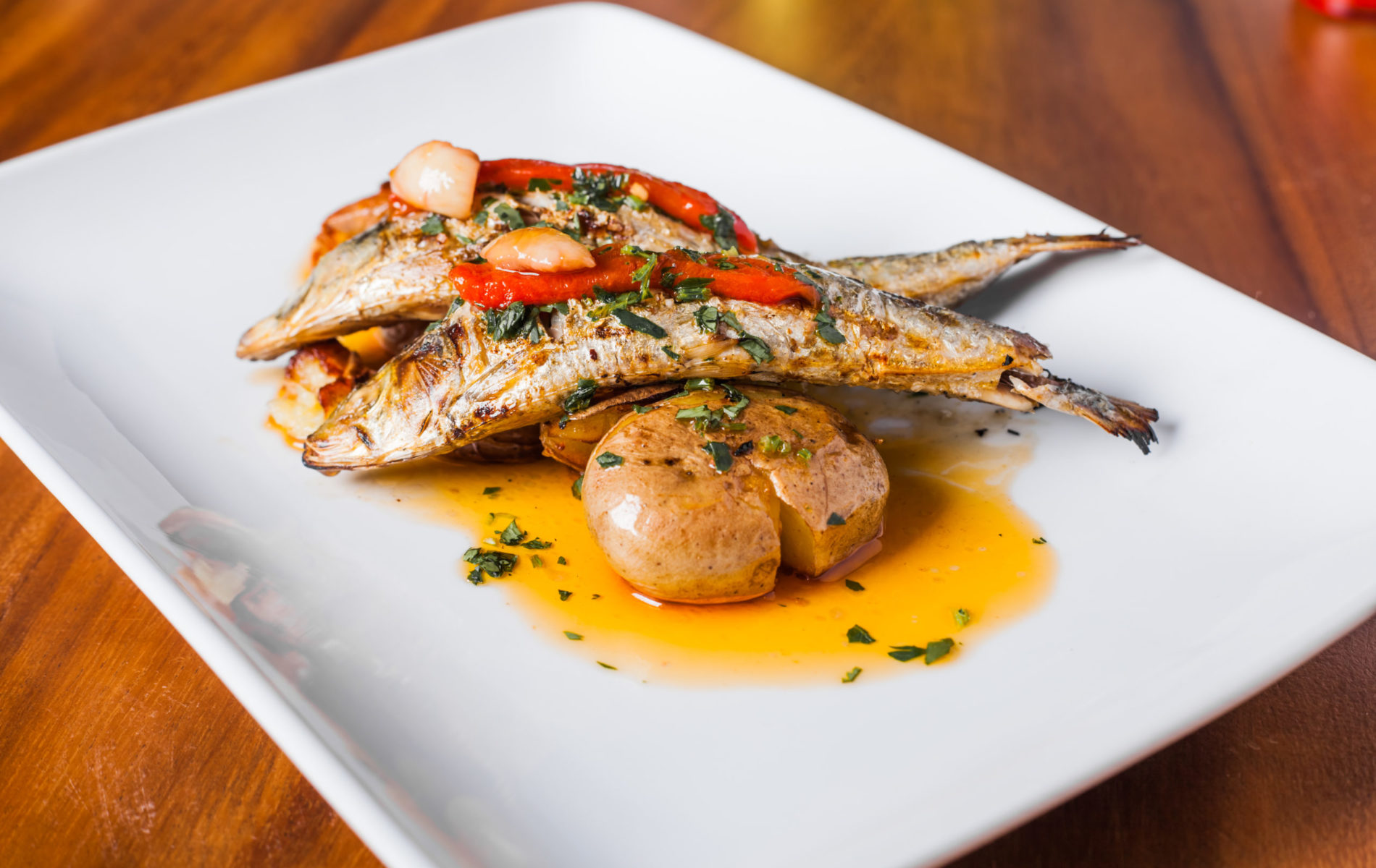 Grilled Sardines Plate with Red Pepper and Potato in a Portuguese Restaurant