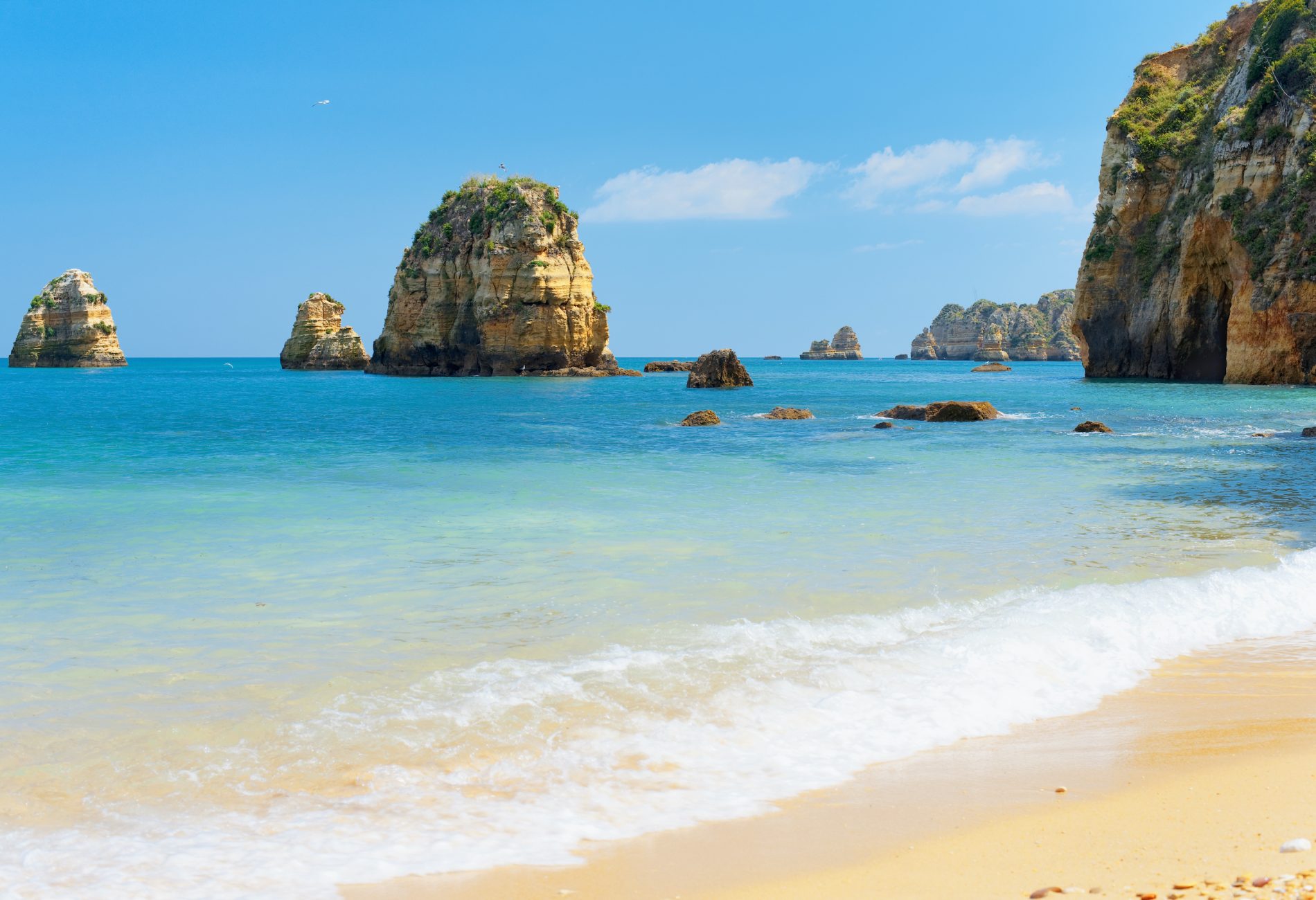 Rocks and sandy beach in Lagos, Portugal
